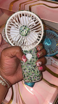 Green bedazzled handheld fan