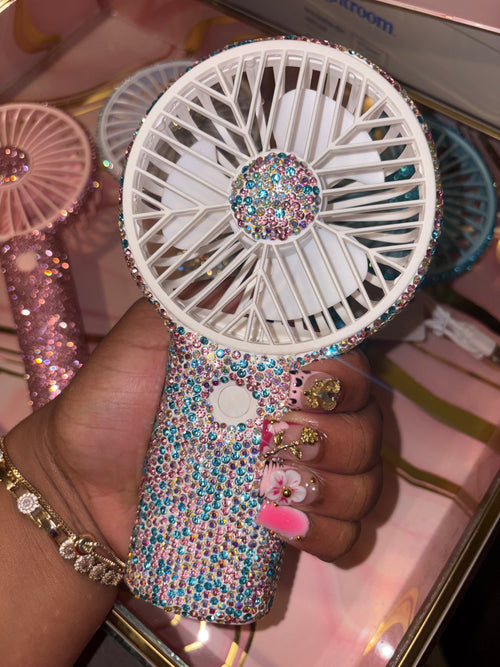 Pink and blue bedazzled handheld fan